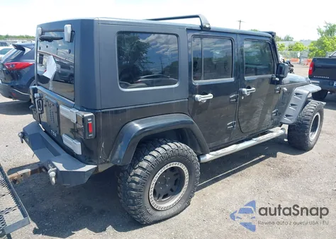 2009 Jeep Wrangler Unlimited Sahara z USA, uszkodzony, nr VIN 1J4GA59109L740206